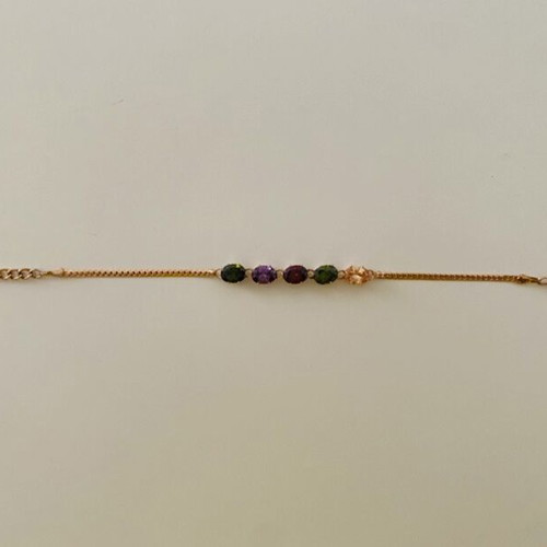 Bracelet used, gold color with multicolored stones