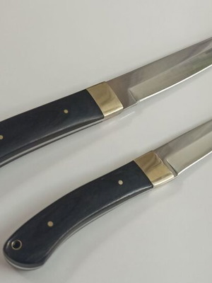 Russian Ohotnik knives new, 65x13 steel, black wood handle