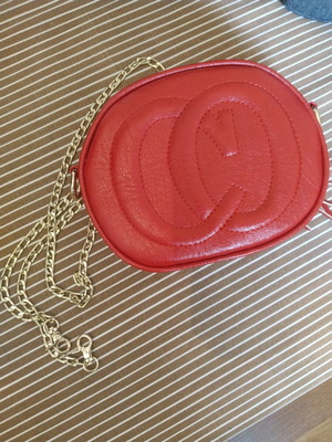 Shoulder bag like new with gold chain red