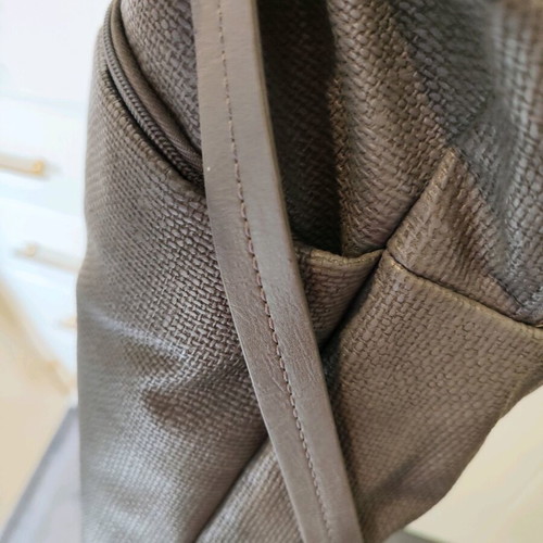 Slang backpack like new gray with multiple compartments
