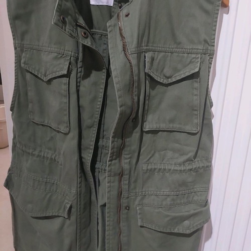 Khaki sleeveless jacket used, size M