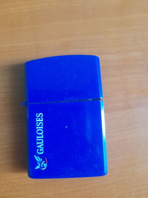 Gauloises lighter used, for repair, missing lid