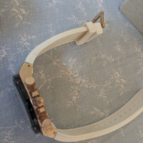 Lofty's wristwatch used, white and pink