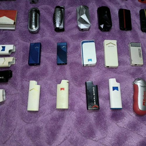 Marlboro lighters and cases used, set of 28 pieces