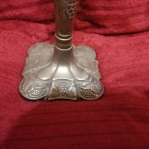 Metal triple candlestick used, ornate and heavy
