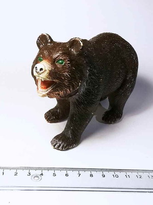 Animal plastic figure used with marks and scratches