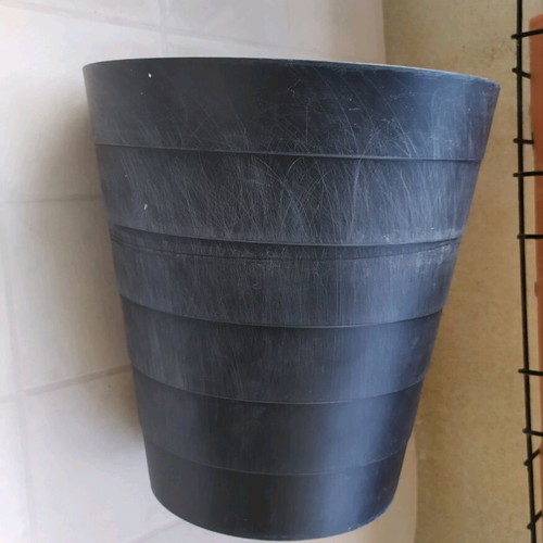 Plastic flowerpot used, black color, height 31 cm