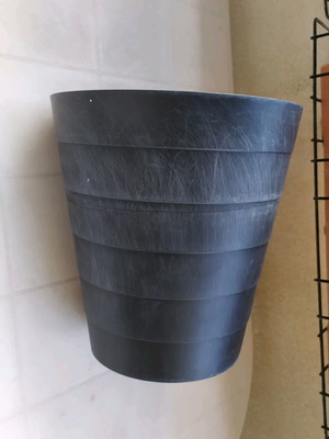 Plastic flowerpot used, black color, height 31 cm