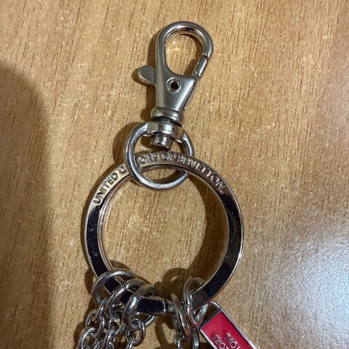 United Colors of Benetton silver keychain like new