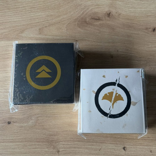Ghost of Tsushima and Ghost of Yotei Platinum Trophy Pins new, factory sealed set