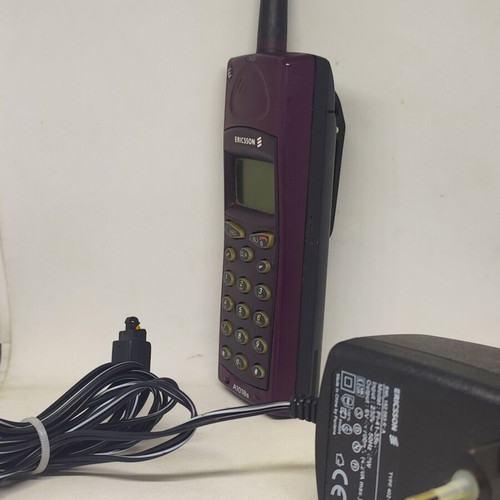 Ericsson A1018s mobile phone like new, plum color, original charger