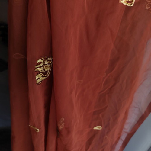 Long brown scarf used with embroidered elephants and paisley
