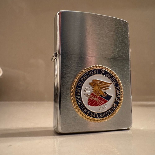 Zippo collectible lighter new with Department of Justice DOJ FBI case