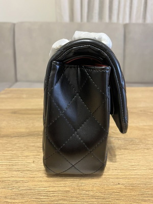 Quilted shoulder bag like new, black