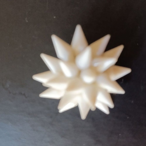 Vintage white clip-on earrings used from the 1960s