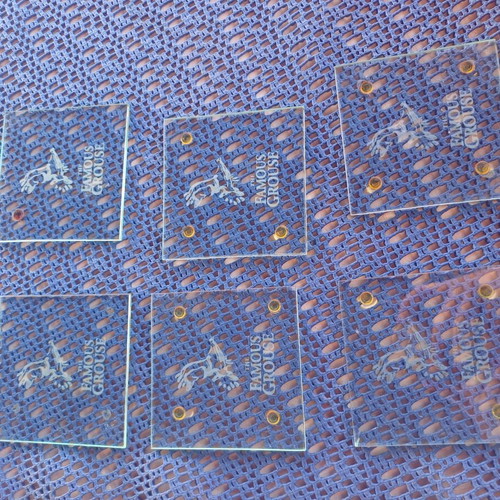 Glass coasters with some minor damage
