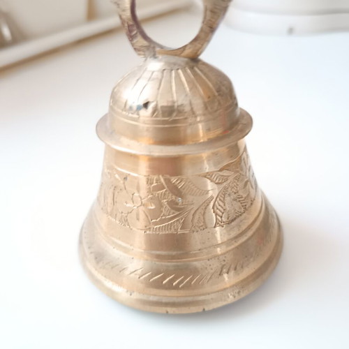 Bronze bell used with traditional engraved floral motifs