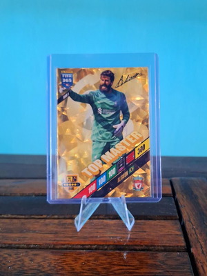 Top Master Alisson Panini Fifa 365 2024 card mint condition