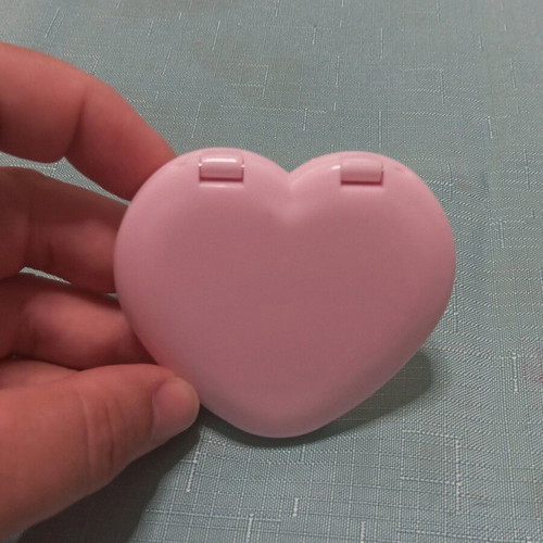 Double heart-shaped pink bag mirror like new, plastic