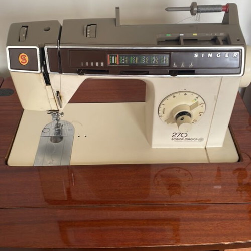 Singer electric sewing machine used, with cabinet