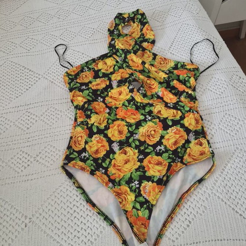 Zara bodysuit like new with yellow flowers on black background