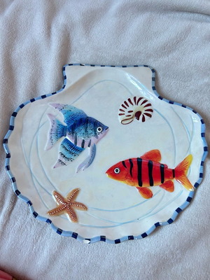 Porcelain platter with colorful fish used