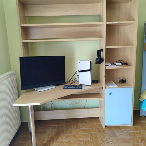 Bunk bed with three mattresses used, includes desk and drawers