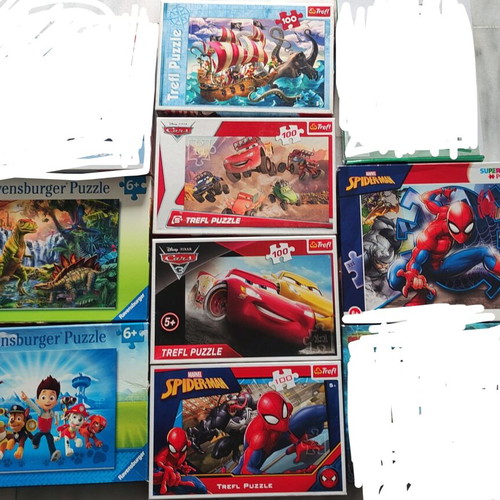 Puzzle set like new, 7 puzzles of 100 pieces each