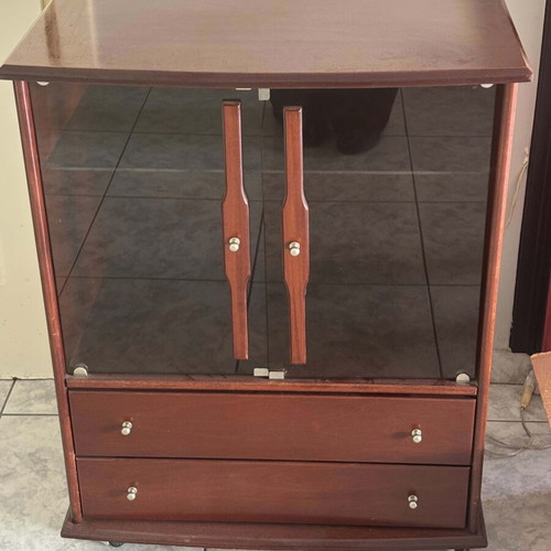 Wooden showcase with glass doors and drawers used