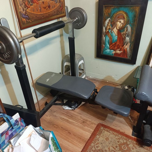 Weight bench with bar and weights used, iron
