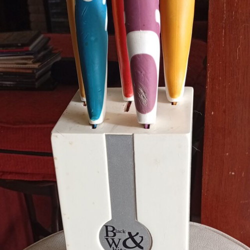 Black & White kitchen knives set used with colorful handles