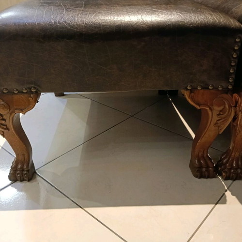 Set of two low chairs used with leatherette and wooden frame
