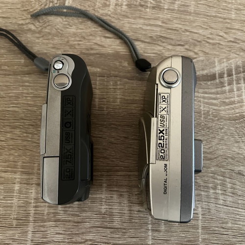 Olympus digital cameras used, pack of 2 with memory included
