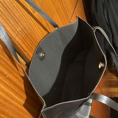 Black shoulder bag unused with space