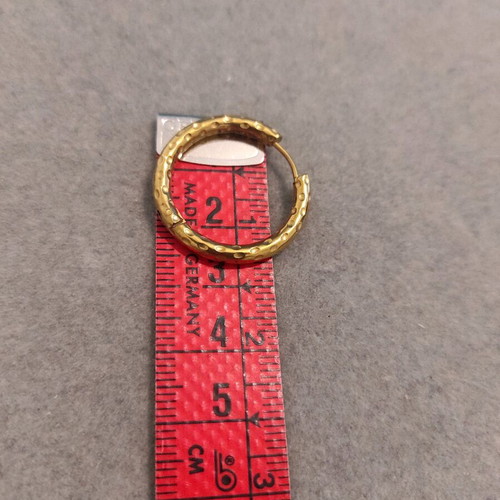 Steel earrings in gold color like new