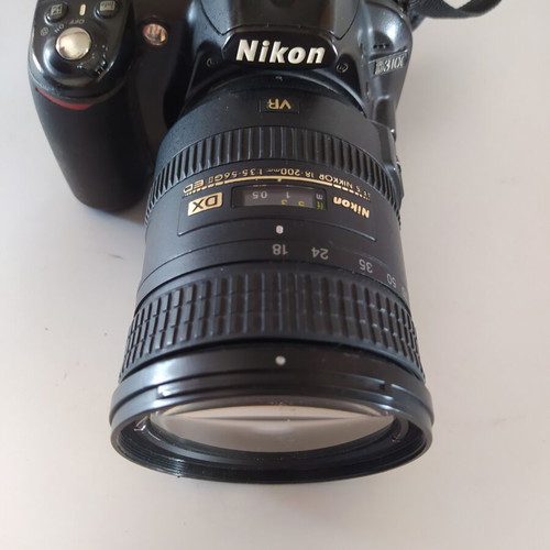 Nikon D3100 DSLR camera used with AF-S DX Nikkor 18-200mm f/3.5-5.6G ED VR lens