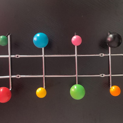 Wall hanger with eight hooks like new, ideal for kids' room