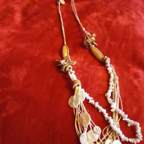 Summer necklace with white coral, cords and shell details