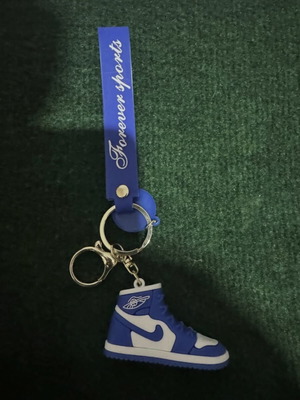 Nike shoe keychain, blue and white