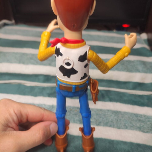 Woody action figure from Toy Story 23cm used, missing hat and nose damage