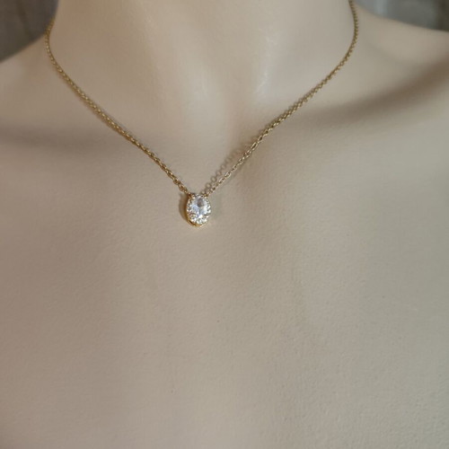 Stainless steel necklace with white pendant