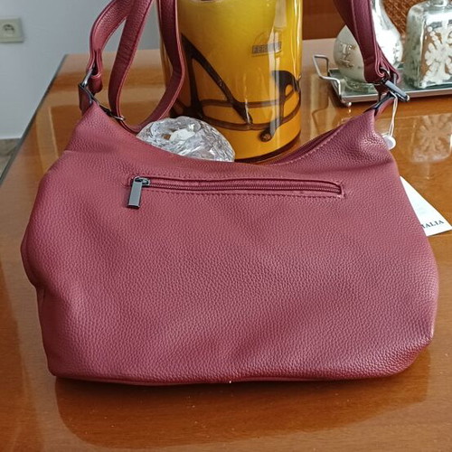 Handbag new, wine color with multiple external pockets