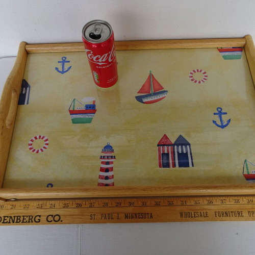 Vintage wooden breakfast tray with nautical theme used