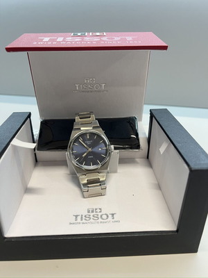 Tissot PRX 40mm Quartz watch with blue dial and steel bracelet