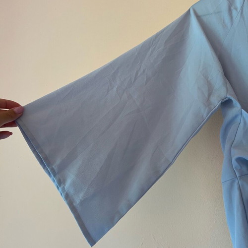 Light Blue Blouse with Belt and Wide Sleeves with Side Zipper like new