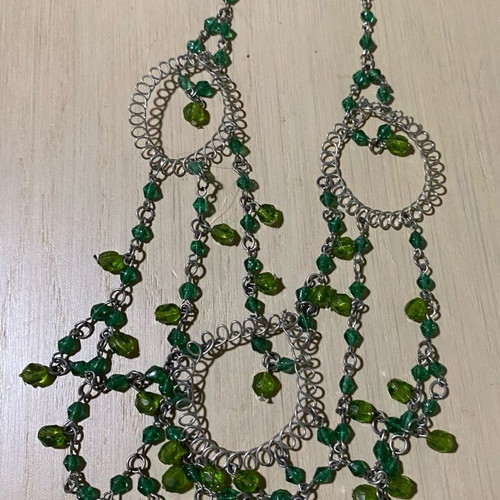 Necklace new with green beads and silver details