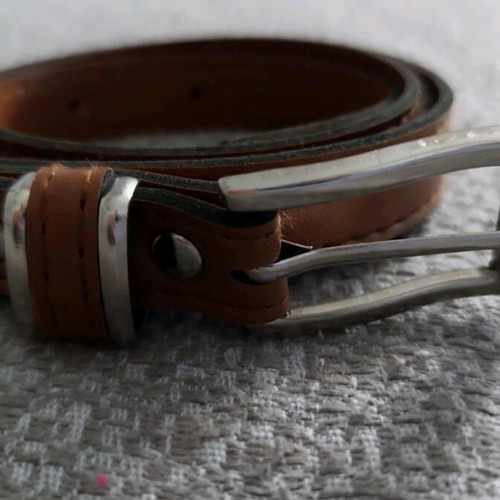 Women's belt used tan with silver buckle