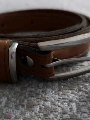 Women's belt used tan with silver buckle