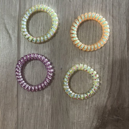 Hair ties, 2 green, 1 purple, 1 orange