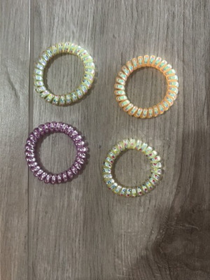 Hair ties, 2 green, 1 purple, 1 orange